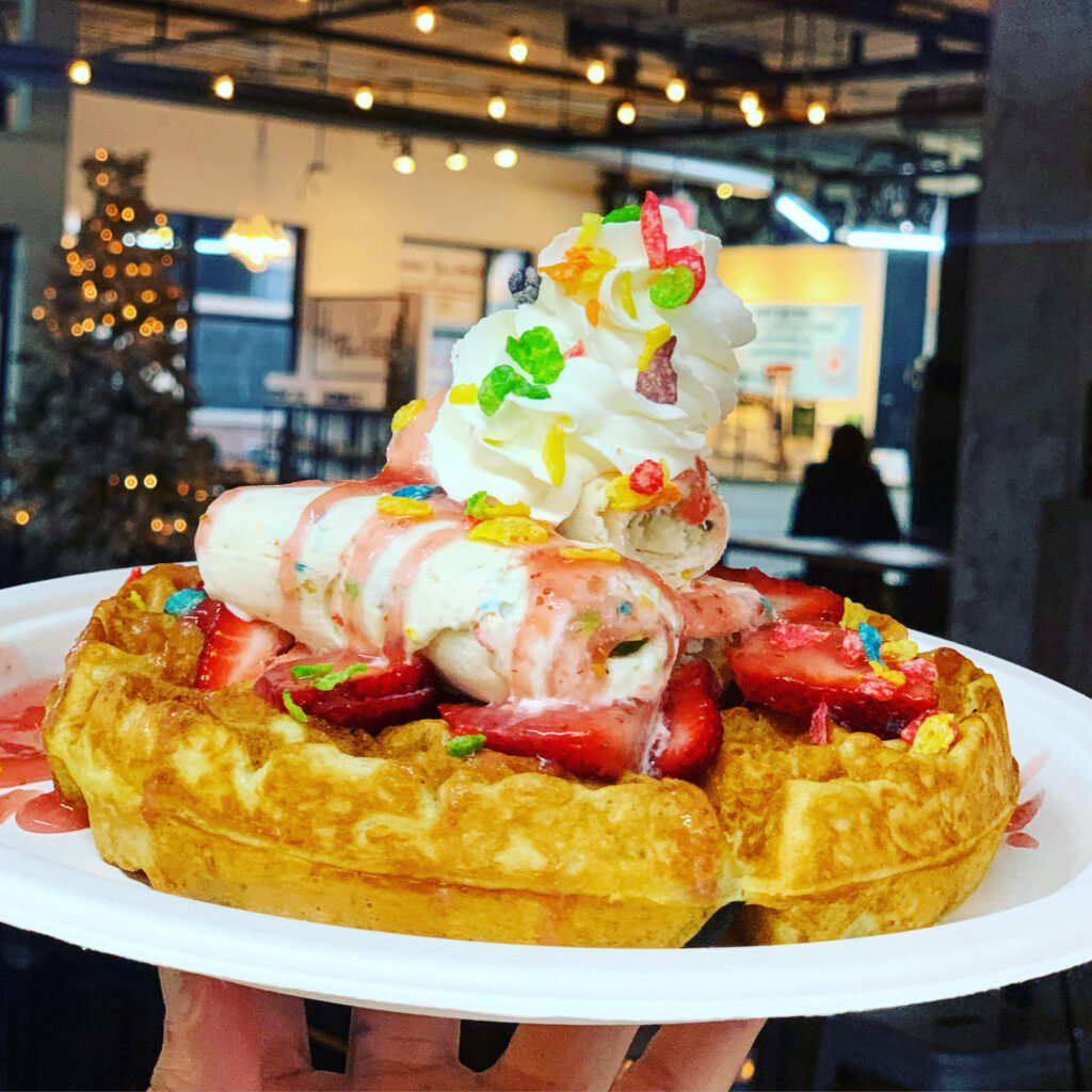 Photo of Buttermilk waffle with strawberry and fruity pebble ice cream 