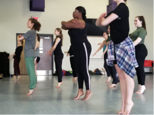 students taking a dance class